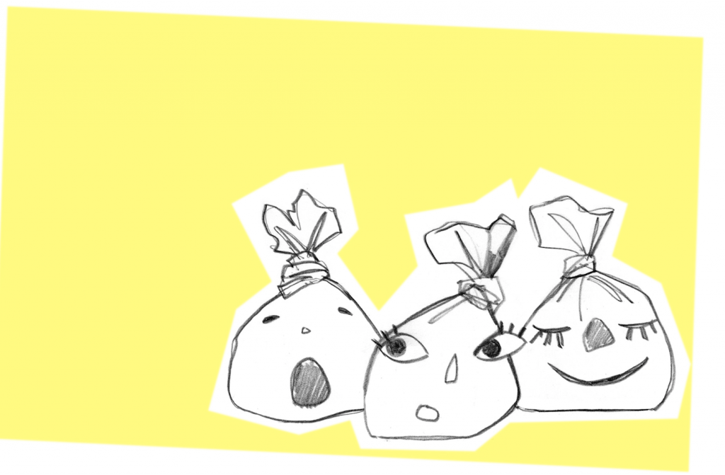 Line drawing on a yellow background of 3 small rice snakes with faces on them