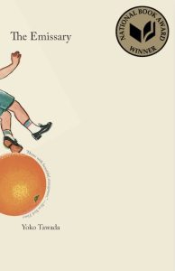 Beige book cover with a person standing on top of an orange with the words: The Emissary, Yoko Tawada