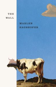 Blue and white book cover with a cow reading: The Wall, Marlen Haushofer