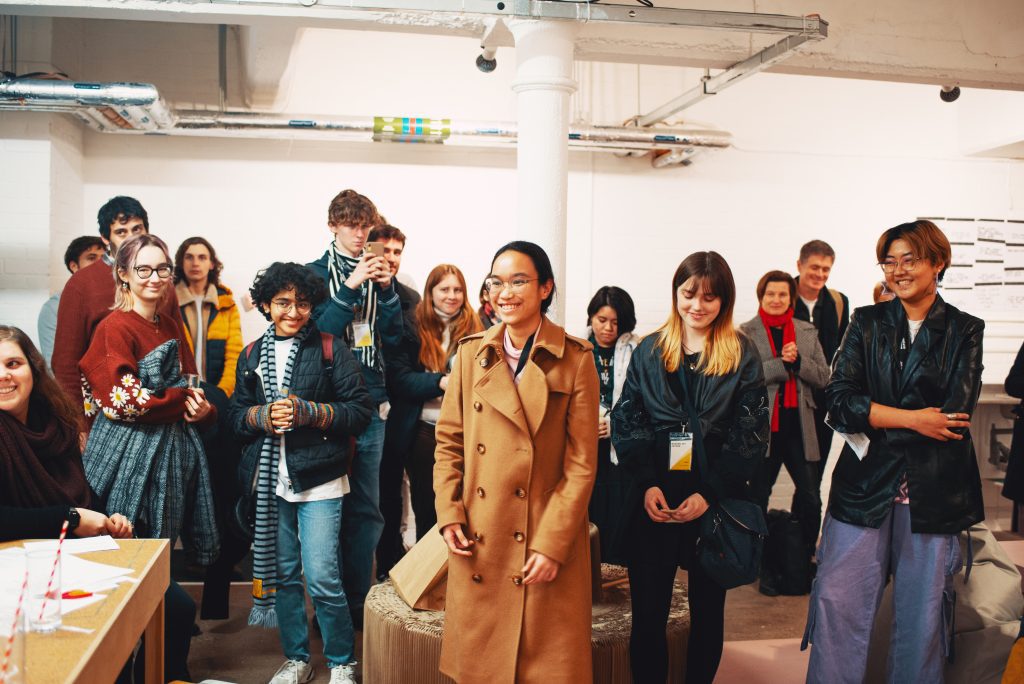 A group of young people in Modern Art Oxford's Creative Space, taking part in a workshop.