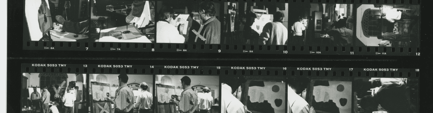 A roll of negative film showing a series of photos of prisoners painting in collaboration with Modern Art Oxford